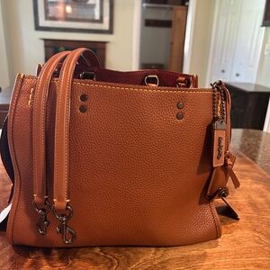 Coach Rogue 30 dark saddle and wine handbag